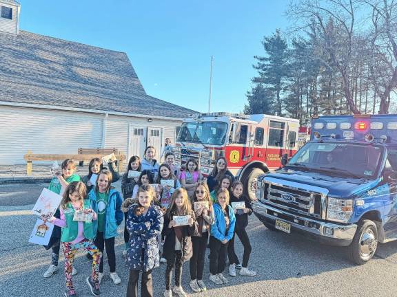 First-responders offer safety tips to Girl Scouts First-responders offer safety tips to Girl Scouts