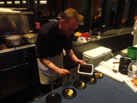 Ken Salmon, owner and executive chef at Lake Hopatcong's Upstream Grille, serves blackened salmon with spaghetti squash and cauliflower puree.