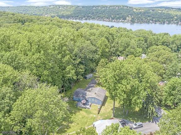 Remodeled home features views of Lake Mohawk