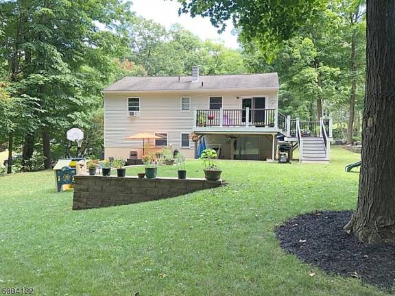 Take your party outside with ease at this renovated bilevel Take your party outside with ease at this renovated bilevel