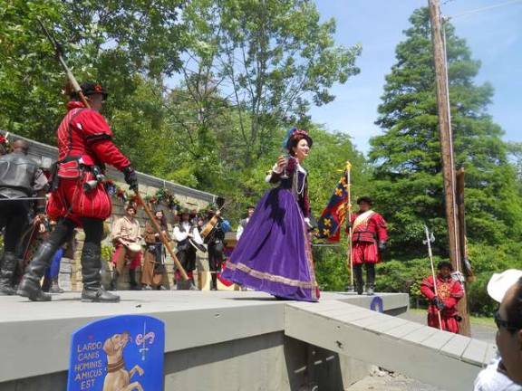 Locals perform at the Renaissance Faire Performing as Queen Elizabeth in the "Mayor's Show" is Lena Chilingerian of Hampton.
