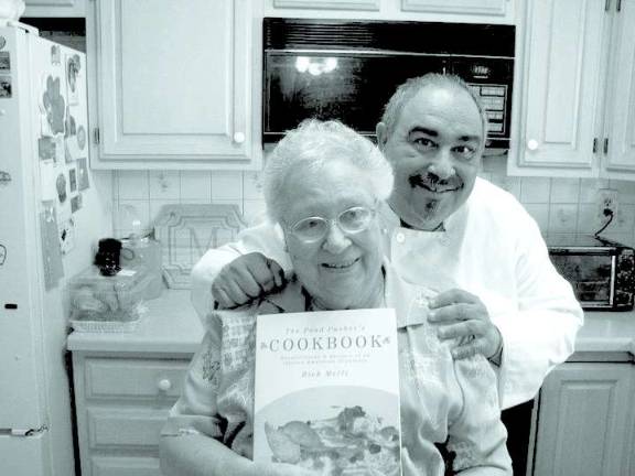Andover firefighter heats up the kitchen Rick Melfi and his mother, Maria.