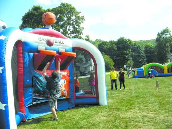 Eddie Wilinski sinks a layup at the sports games.