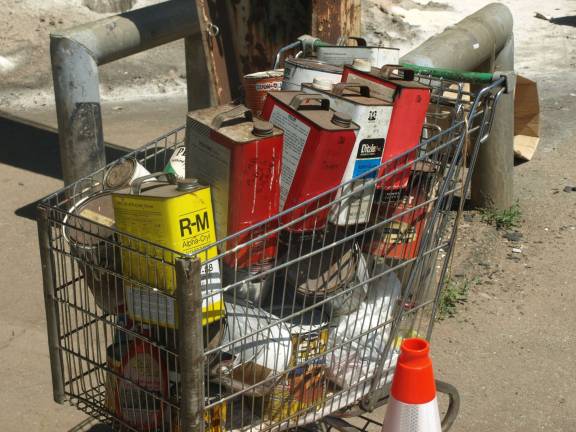 Cart full of household hazardous waste.