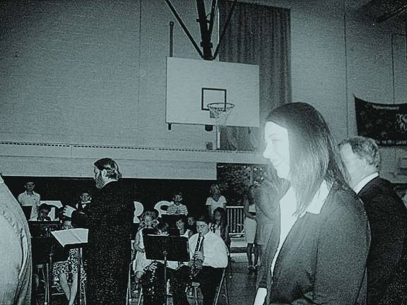 Ogdensburg School celebrates 8th-grade graduation Assistant Principal Stephanie Bonaparte walks into the ceremony.