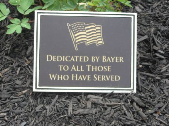 The Bayer Corporation planted beautiful shrubs, ferns and flowers at the cemetery.