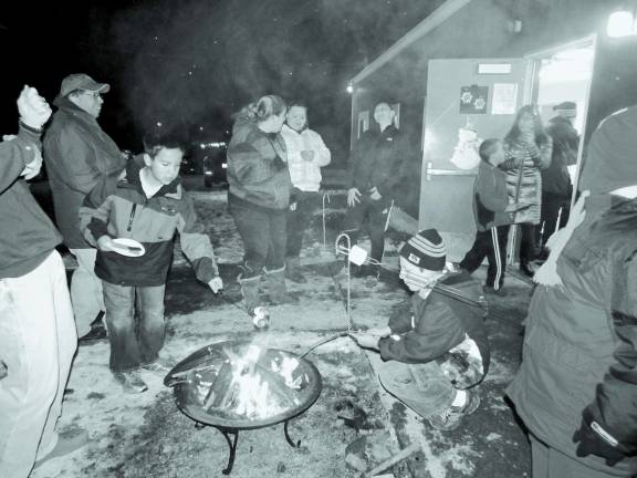 School officials host barbecue, campfire School officials host barbecue, campfire