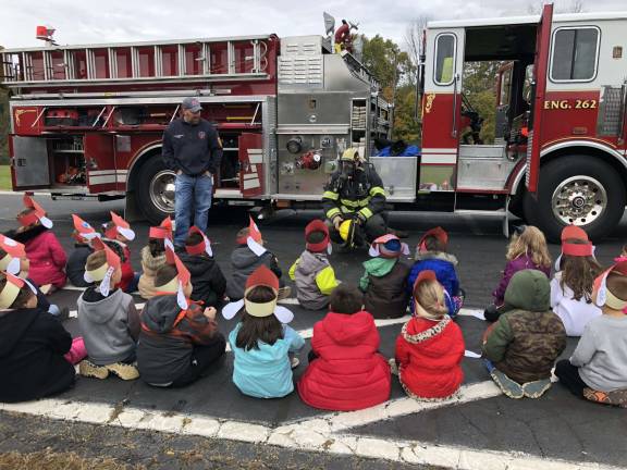 Firefighters talk to Franklin kindergartners