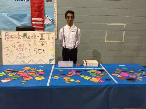 Dharmil Bhavsar selling his homemade book marks.