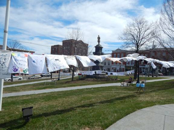 T-shirts written with messages were hung up in Newton Twon Square as part of the Clothesline Project on April 15.