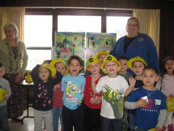 Claudia Raffay and her assistant from Sussex Rural Electric visited Prince of Peace Early Learning Center in Hamburg to show the children how to be safe around electricity, inside and outside of the home. The children had a great time with the interactive &quot;hazard hamlet&quot; which showed them how electricity worked and how it could be used safely.