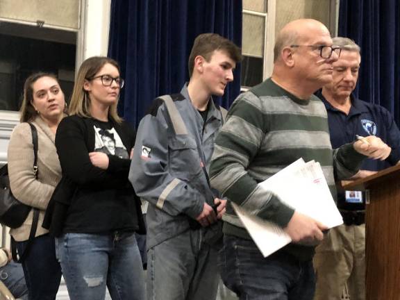 UPDATE: School board removes book from middle school Chad Wood, center, the student representative to school board, waits to talk during the public comments.