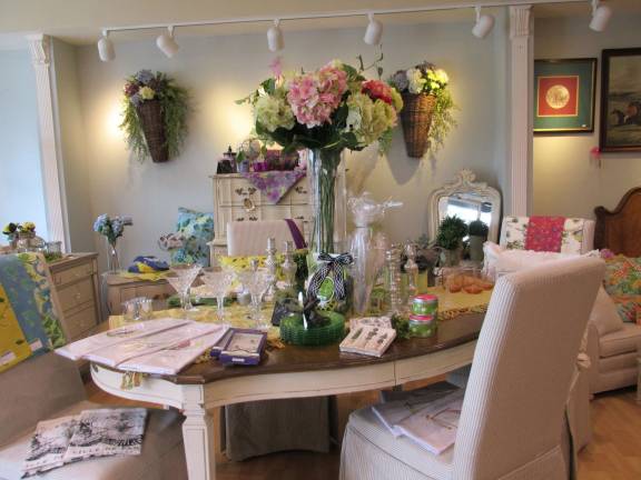 Photos by Laurie Gordon Faux floral arrangements on display for purchase as wedding centerpieces, home decor and more.