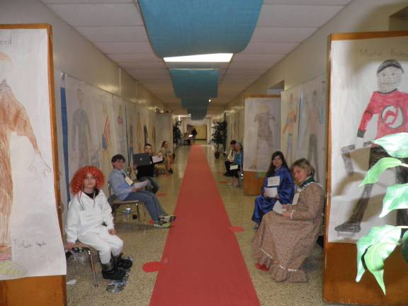 Students bring famous figures to life through 'wax musuem' Pictured on the left side: Matt Dressner as Shaun White, Andrew Birkelbach as Bill Gates, Tony Ciappara as Steve Jobs and Sophie Clohessey as Jane Goodall. Pictured on right side: Melanie Saalerno as Hellen Keller, Paige Hannon as Sandra Day O'Connor, Madison Bowden as Ashley Simpson and Jadon Emidio as Walt Disney.