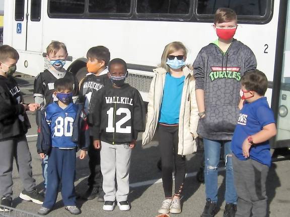 Volunteers from the Wallkill Valley Youth Football and Cheer were only too happy to help during the Stuff the Bus food collection (Photo by Janet Redyke)