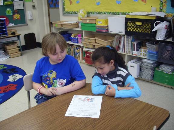 Reading buddies Casey Stickle and Alyssa Frazier