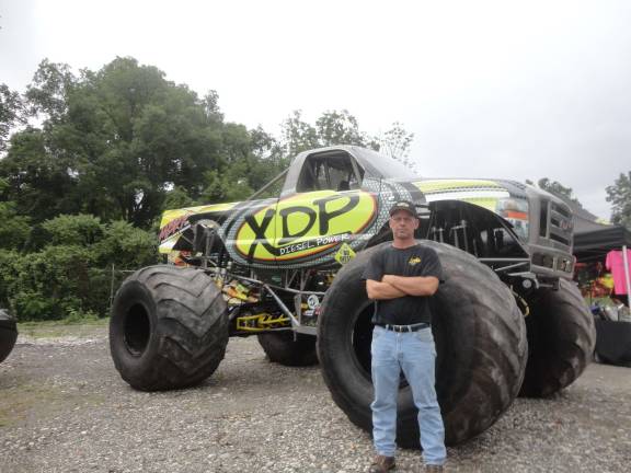 Noisy fundraiser helps firefighters Ogdensburg native Dave Radzierez stands with his XDP monster truck, on display at Hamburg Fire Department's dyno day. PHoto by SCOTT BAKER