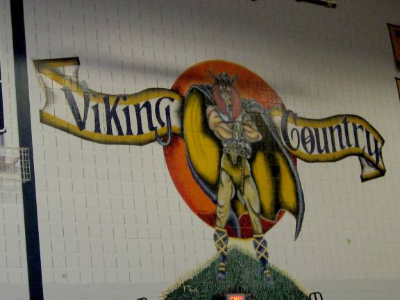 Rain pushes VTHS graduation indoors PHOTOS BY JANET REDYKEA mural on the wall of Vernon Township High School's gym greets the masses on Graduation Day June 18.