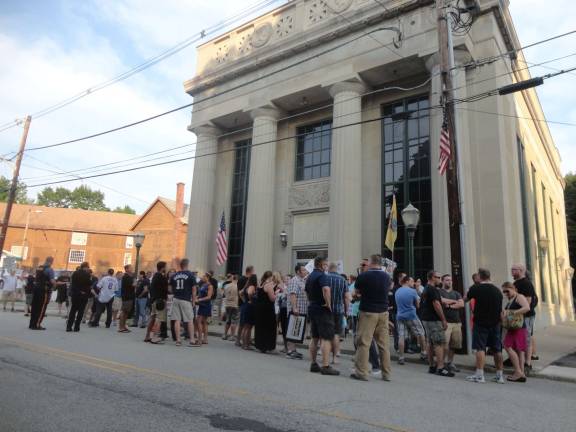 Embattled councilman Fanale steps down The municipal building is filled to capacity.