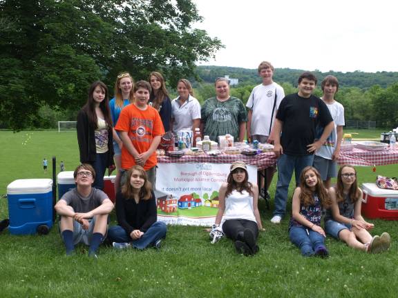 Ogdensburg students participate in Teen Canteen Some of the Ogdensburg class of 2014 at Saturday's Teen Canteen event at the Ogdensburg School playing field.