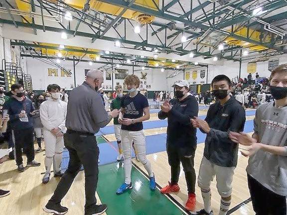 Pope John fencer from Hamburg finishes fourth in state championships Allen Trudnos receives fourth-place medal for Men’s Saber (Photo provided)