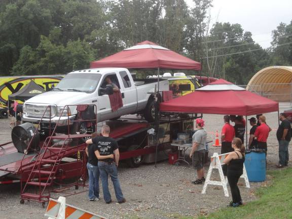 Noisy fundraiser helps firefighters Dale Homnick from Axcelerated Motorsports runs a truck on his dynomometer.