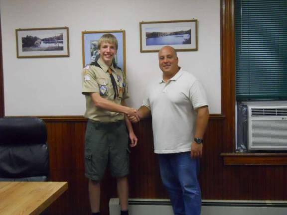 Christopher Peterson shakes hands with Ogdensburg Mayor Steve Ciasullo upon completion of his Eagle Scout project.