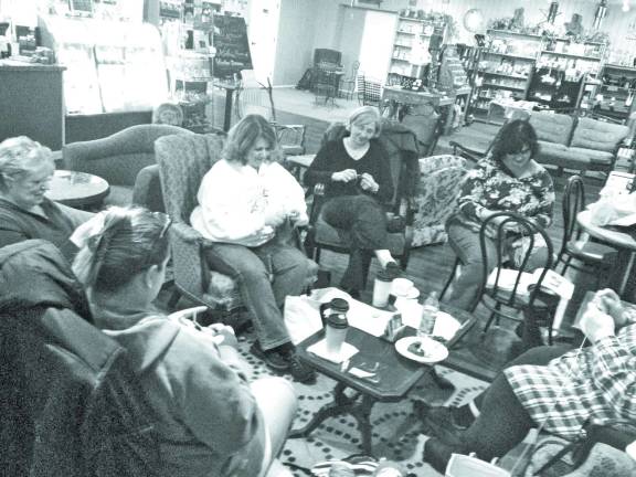 Photo provided Louise Murphy of Franklin (shown in the white sweatshirt) leads the Toasty Noggins chapter of Crochet for Cancer where local women crochet hats for infants and those battling cancer.