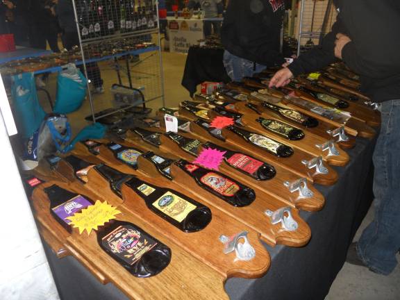 An assortment of bottle openers for sale.