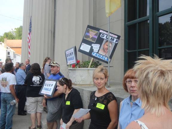 Photos by Scott Baker Hundreds gather outside as the municipal building is filled to capacity.