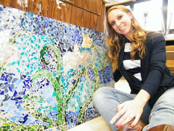 High Point art students create stained-glass murals Visual-Fine Arts teacher Kelly Kuzicki with, 'A Field of Peace Poppies,' completed in three months by her Exploratory MCI Art students; will be hung in the English department at High Point.