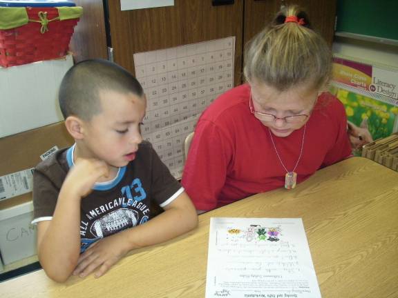 Reading buddies Joey VanTassel, Kayla Owens