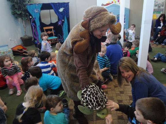 Great Beginnings celebrates Day of the Young Child Marcia the Musical Moose shows off some of her friends from the sea.