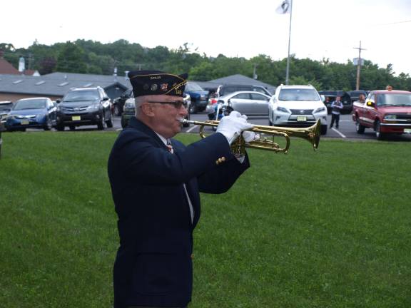 Retiring of the flag Robert Caggiano plays "Call to the Colors."