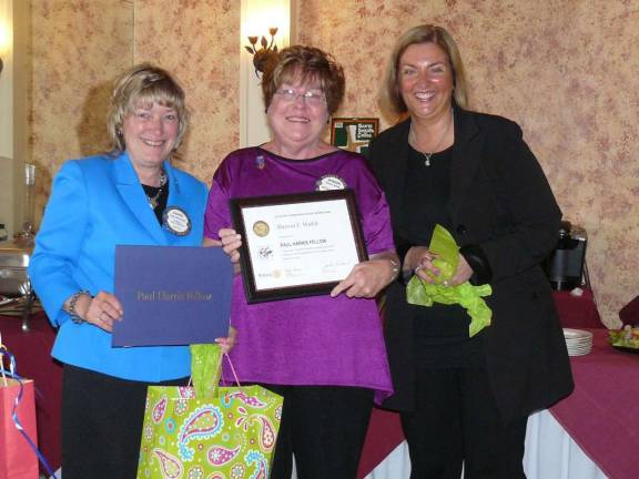 The Wallkill Valley Rotary Club was pleased to present a Paul Harris award to Sharon Walsh, pictured center. Karen McDougal, immediate past president on left, Alexis Horvath, current president on right.