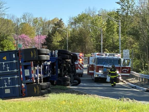 UPDATED: Crash closes Route 15 ramp in Sparta A dump truck is on its side on the northbound off-ramp of Route 15 leading onto Route 517 in Sparta on Wednesday morning, April 30. (Photo by Jeanne Straus)