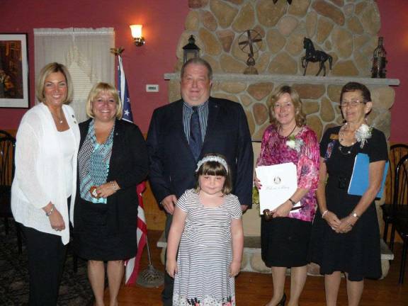 Wallkill Valley Rotary Club welcomes new members. Pictured are Alexis Horvath, sponsor, Brenda Lee Zabriskie, Timothy Dziekonski (with daughter Madelyn accompanying him) Karen McDougal, club president, and Sharon Hosking, past president. They were inducted at the club's installation dinner.