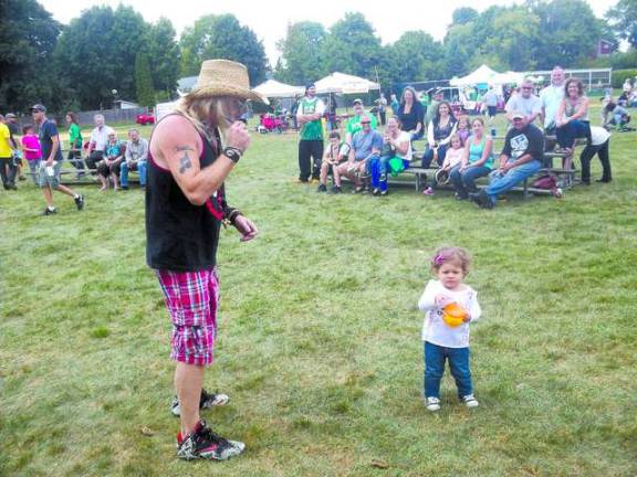Ogdensburg celebrates party of the century Fifteen-month-old Brooke Egli steals the show.