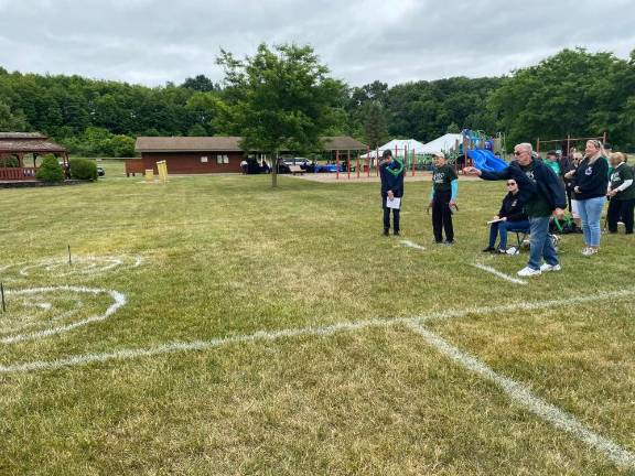 6 teams compete in Senior Olympics The horseshoes competition.
