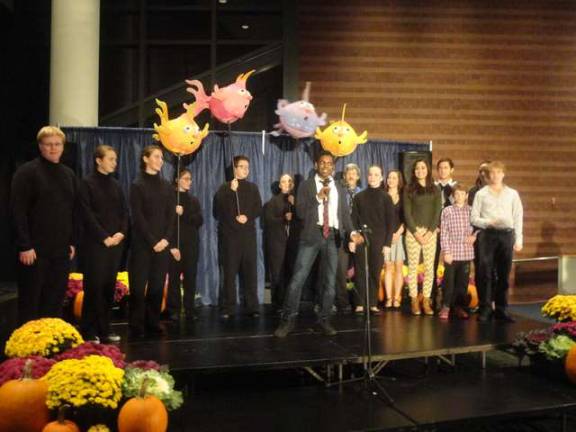 The cast of the Little Mermaid sings Under the Sea.
