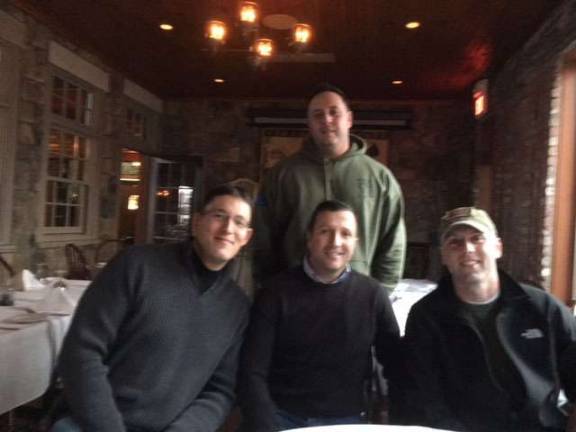 Police officers preparing to cycle for the fallen Four members of Team West Milford at the Mohawk House, seated from left; West Milford P.O. Rob Kulawiak, Sparta Police Sgt. Rob Fraser, Jefferson Township P.O. Dan Florio; standing, West Milford P.O. Anthony Frassa