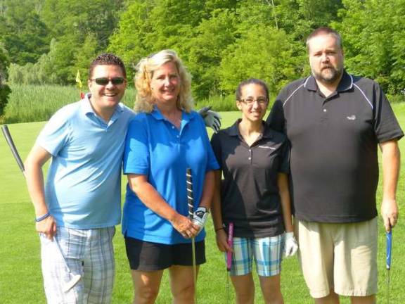 Dani Nasiby's family is shown with Steve Allan from WSUS 102.3.