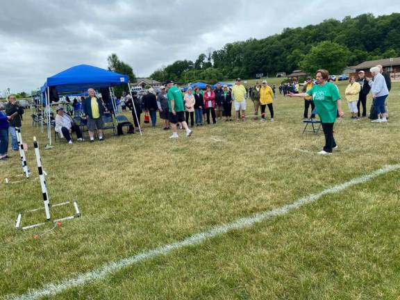 6 teams compete in Senior Olympics The ladder toss competition.