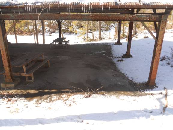 Prospective Eagle Scout cleans up pavilion The pavilion is shown before the project.