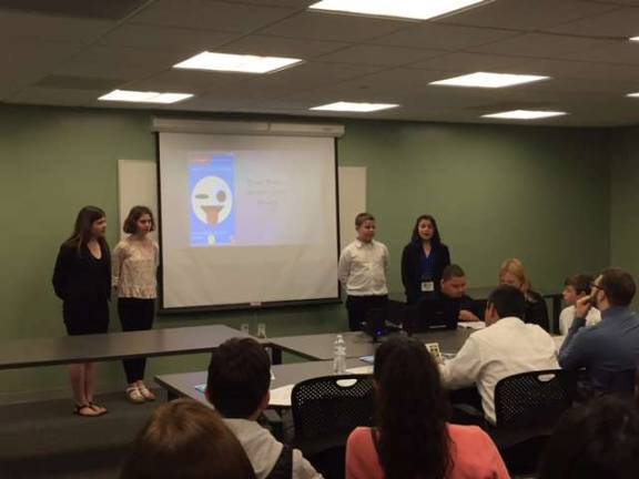 6th graders pitching their app idea &#xfe;&#xc4;&#xfa;Road Riders&#xfe;&#xc4;&#xf9; to the judges. Pictured: Madison Pellicier, Dayna Alemy, Brian Hall, and Asia Lamlamay