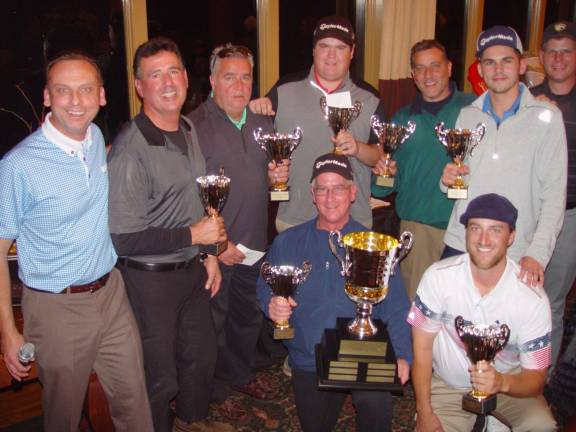 Crystal Springs Vice President of Golf Operations Art Walton presents the Wild Turkey Golf Team with the Crystal Springs Employee Cup as the 2018 Champions.