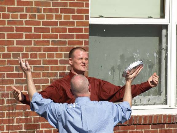 Pies on Pi Day Superintendent/Principal Tim Nicinski doesn't let Assistant Principal/Social Studies teacher Mike Ryder of Franklin get away without a pie facial.