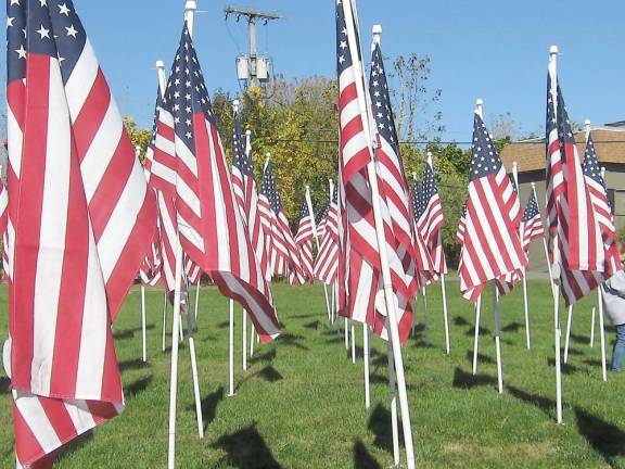 Flags for Heroes fly in Vernon The flags will remain flying until Veterans Day, Nov. 11 (Photo by Janet Redyke)