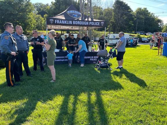 FN2 Residents talk to members of the Franklin Borough Police Department.