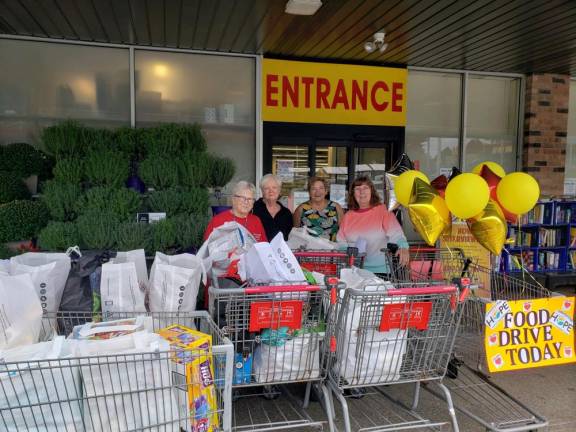 From left, Judy Miller, Pat Korger, Sharon Fitch and Robyn Matyisin collect donated food at the ShopRite in Franklin on Sunday, Sept. 10. The donations will go to the food pantry at the Vernon United Methodist Church, where supplies have been running low. (Photo provided)